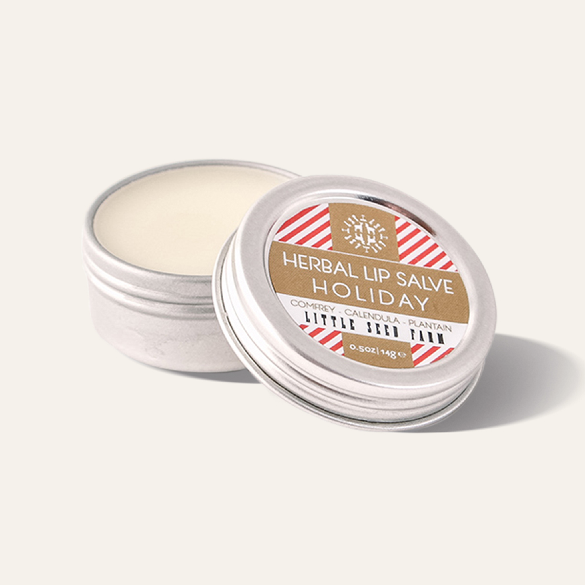 Rich, creamy peppermint‑vanilla lip salve with shea butter, coconut oil, and beeswax to deeply moisturize dry or cracked lips.
