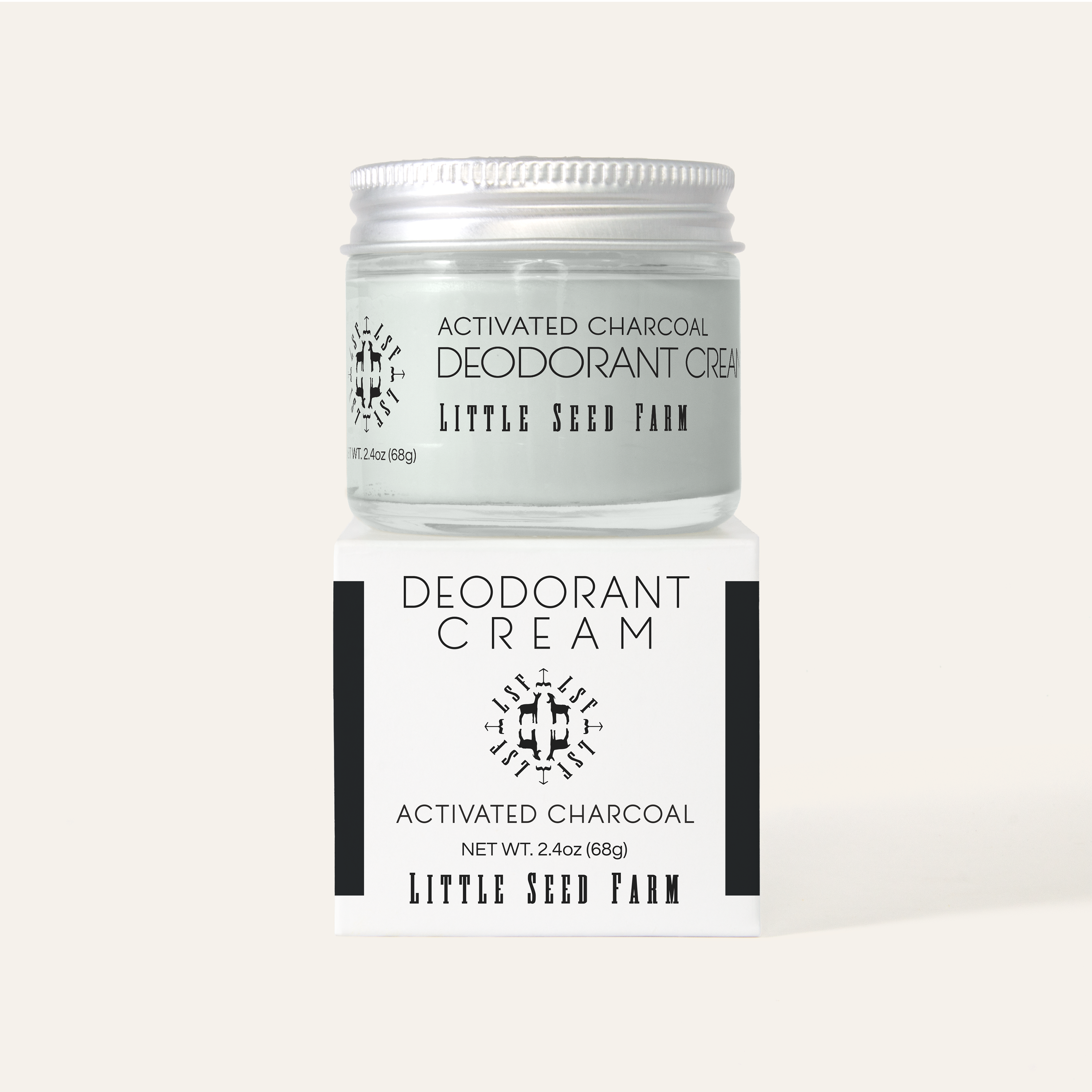 Activated Charcoal Deodorant Cream by Little Seed Farm in a glass jar, showcasing its sleek black formula and minimalist label.