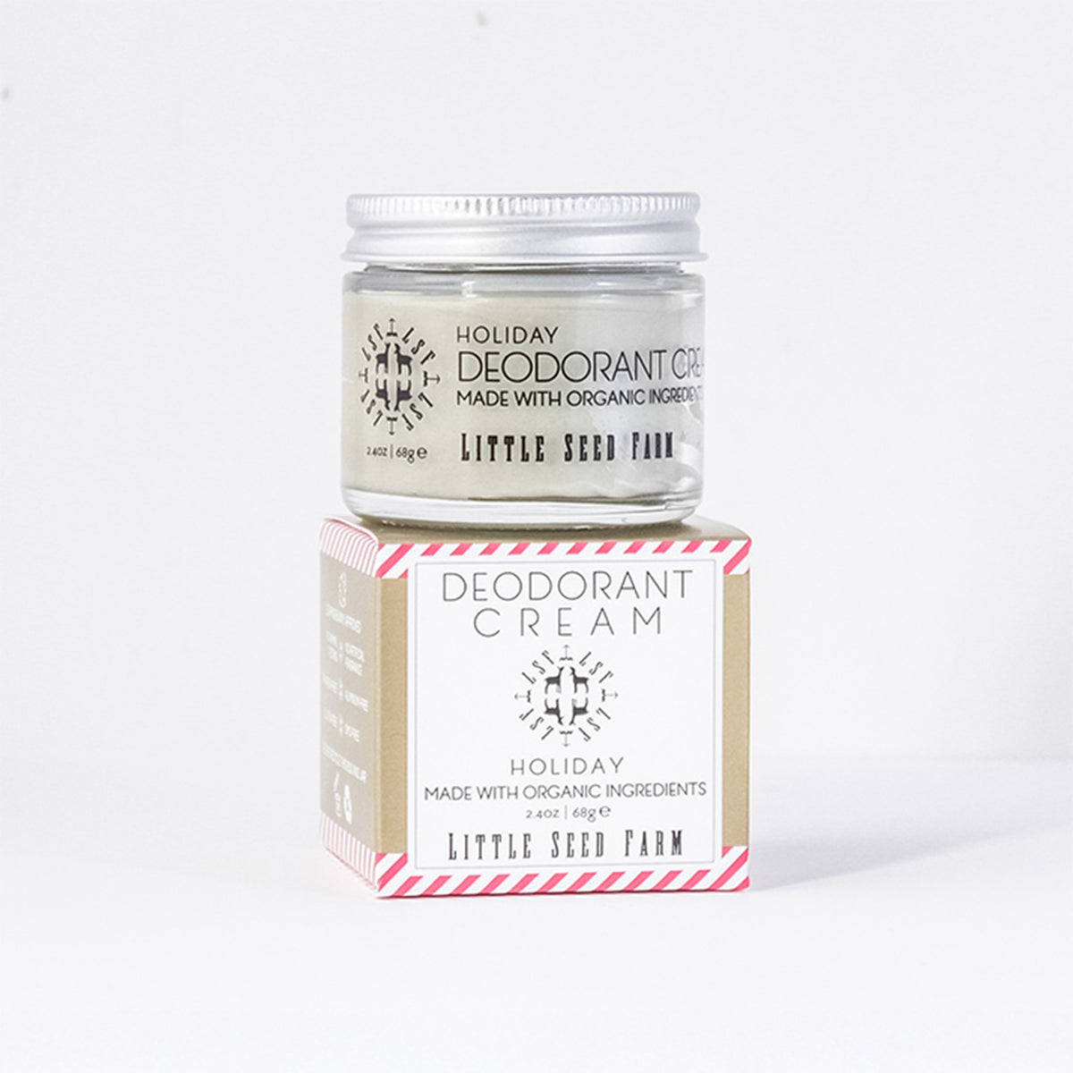 Little Seed Farm Holiday Deodorant Cream jar resting atop its matching box; a simple, elegant holiday presentation.