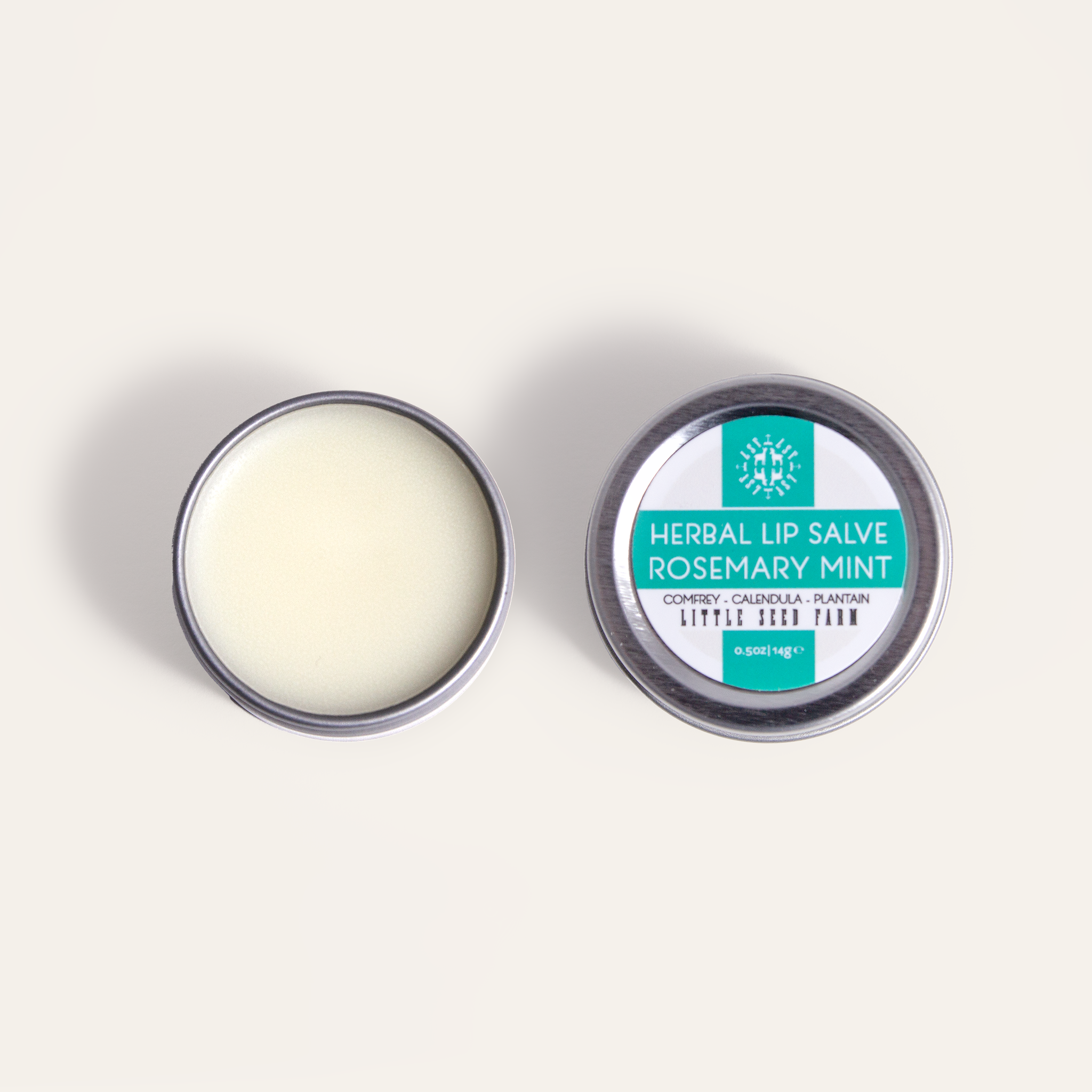 Rosemary Mint Herbal Lip Salve: a minty‑herbal balm made with organic shea butter, herb‑infused coconut oil, beeswax, and essential oils of rosemary and spearmint to soothe and hydrate chapped lips.