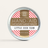 a tin of little seed farm holiday hand aid.