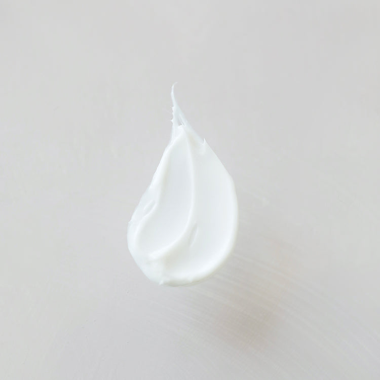 Ingredients card listing key actives like alpha‑hydroxy acid from goat’s milk for brightening, antioxidant-rich argan oil for renewal, perilla oil for redness relief, and aloe for soothing hydration
